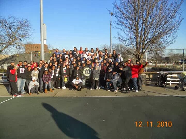 Young people and community members gathered with The 54th