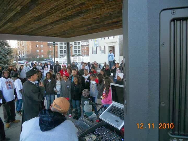 Youth and community members taking part in a 54th program